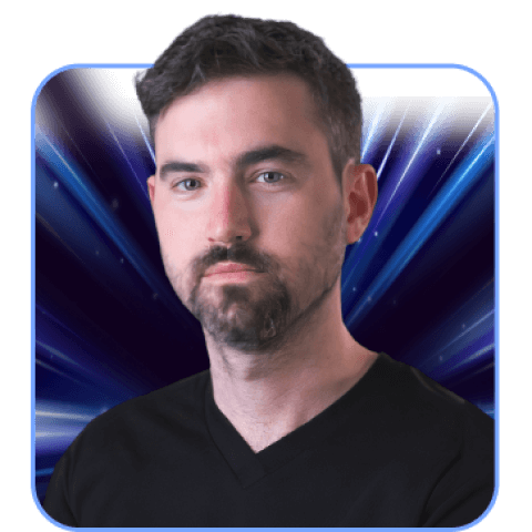 Man with dark hair and beard on blue background.